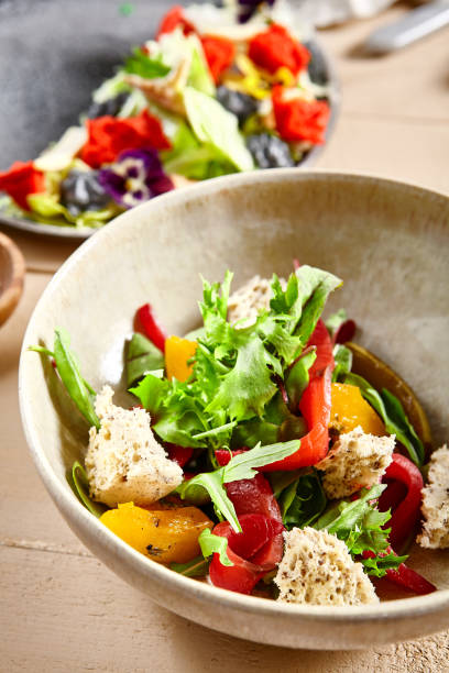 istock Salmon fillet salad in clay plate 1218959576