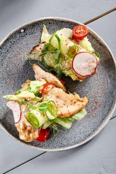 istock Bruschetta with turkey in nut sauce in gray plate 1218959616