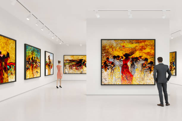 Art museum Young couple visits art exhibition and looking at the fine art paintings in a art gallery. art gallery stock pictures, royalty-free photos & images