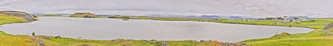 Panoramic picture from Hverfjall volcano to Mývatn lake area in Northern Iceland in summer