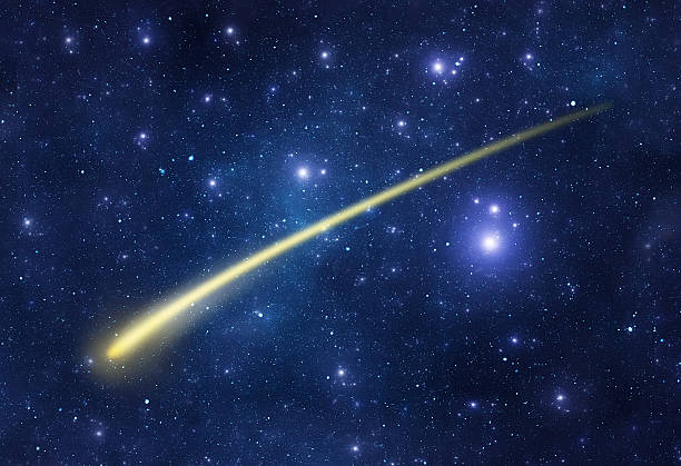 Comet and galaxy Galaxy background with yellow comet comet stock pictures, royalty-free photos & images