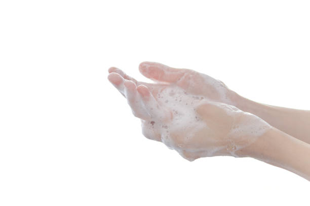 istock Wash hand with soap isolated on white background 1218963649
