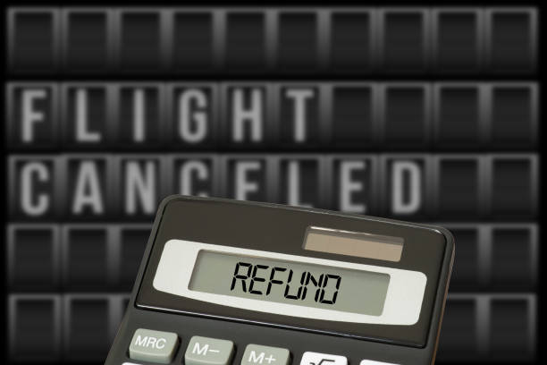 Calculator and refund for cancelled flight Calculator and refund for cancelled flight travel refund stock pictures, royalty-free photos & images