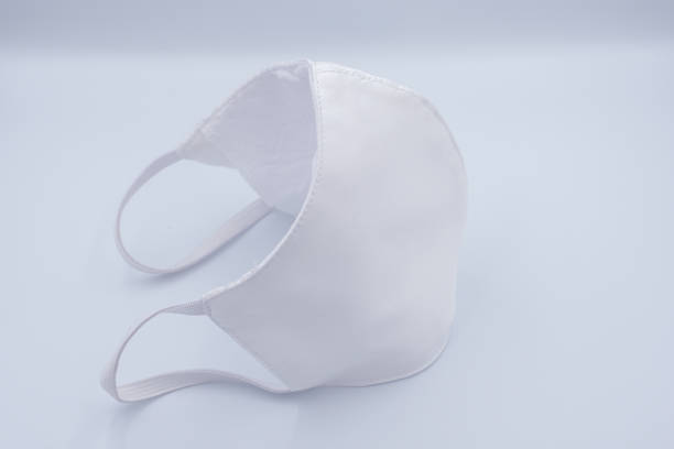istock Handmade medical cloth mask isolated on white background 1218964389