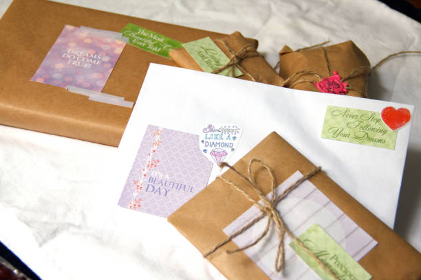 istock Delicate wrapped gifts on a white background. 1218964455