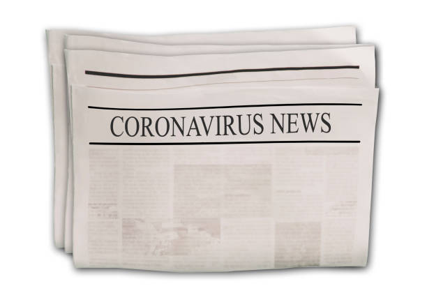 istock Coronavirus Covid-19 news. Newspapers with headlines on horizontal surface. 1218966851