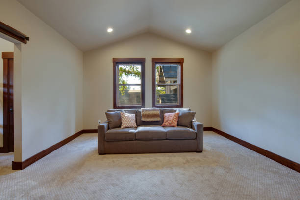 istock Large family game fun room with tall vaulted ceiling and large double windows 1218966883