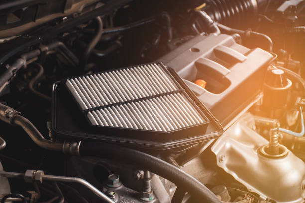 istock Car air filter place on engine cover. 1218968853