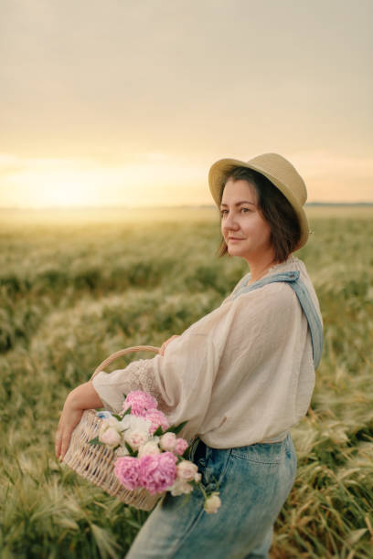istock a woman in a jumpsuit 1218968962