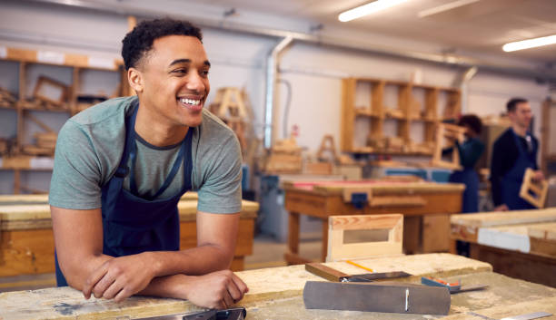 istock Male Student Studying For Carpentry Apprenticeship At College 1218970996