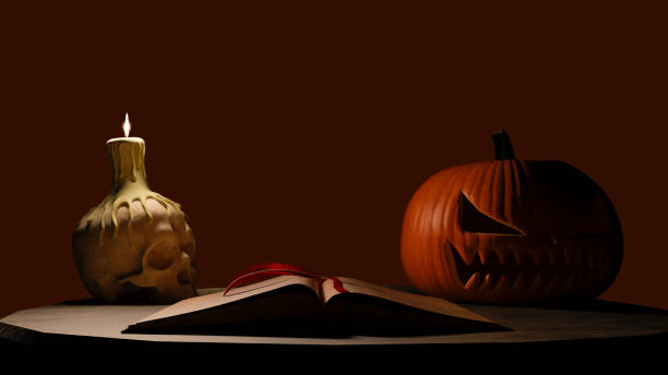 istock Vintage old Halloween book with skull candle at night 1218971796