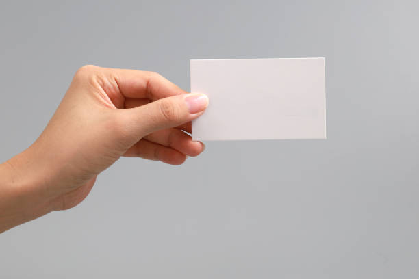 istock Hand Holding Business Card 1218975694