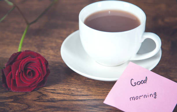 istock red rose and cup of coffee 1218976369