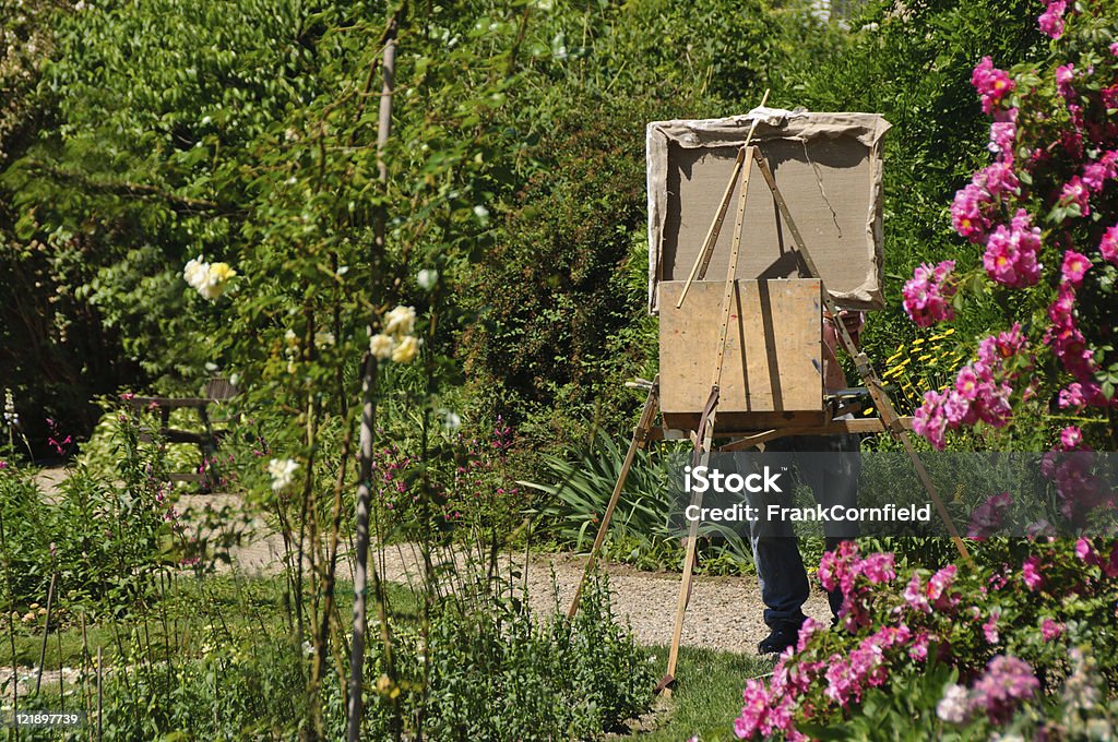 Artist in garden  Adult Stock Photo