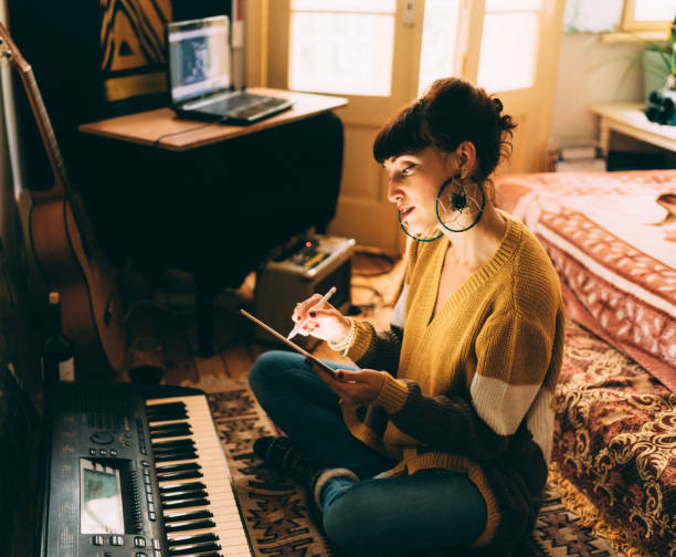 istock Musician working on new song 1218981565