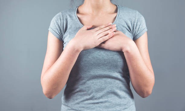 istock woman hand on heart 1218983257