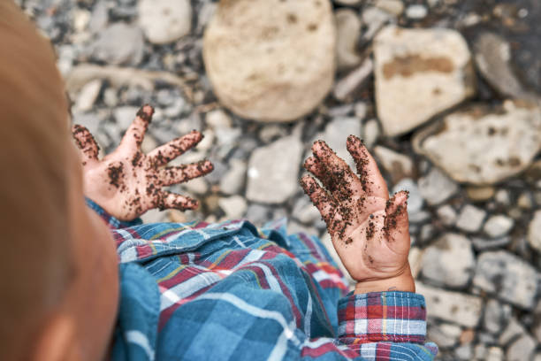 Little boy stained his hands. Hygiene and children healthcare concept. Washing hands