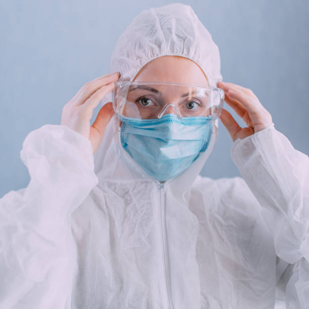 istock Female doctor in a protective suit. 1218983376
