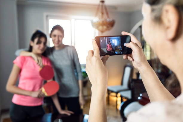 istock Playing table tennis at home 1218983456
