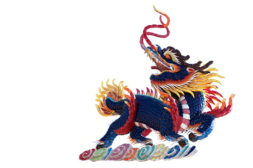 Chinese blue Kirin statue for decoration in the temple isolated on white background.