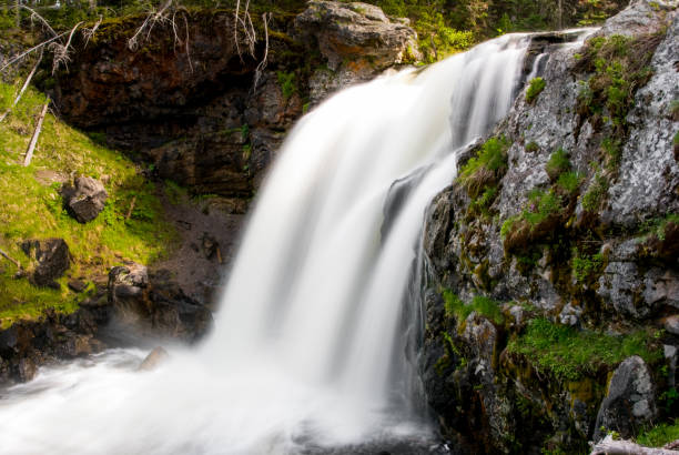 istock Flowing waterfall in Yellowstone National Park 1218984180
