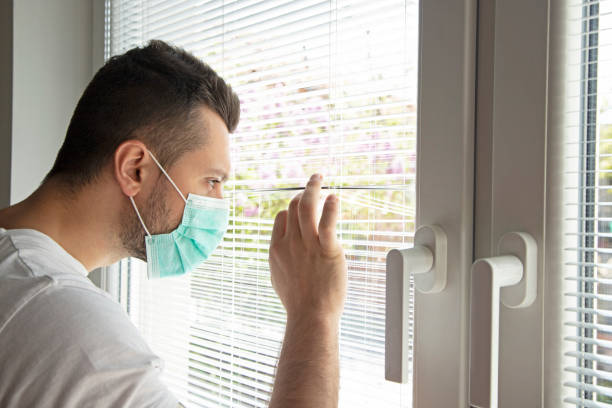 istock Young man in isolation at home 1218985363