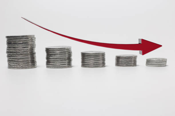 istock Loosing Money Concept with red down arrow 1218985487