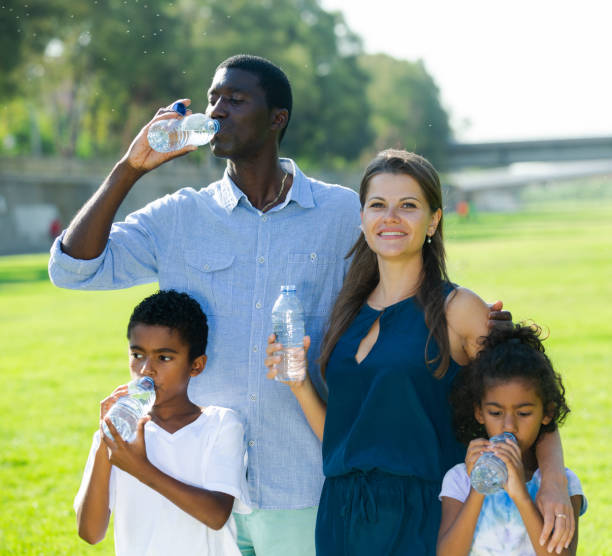 istock Family drinking water on walk 1218985533