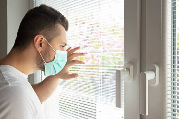 istock Young man in isolation at home 1218985736