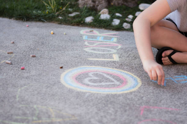 istock Heart drawn with colored chalks on the street 1218985780
