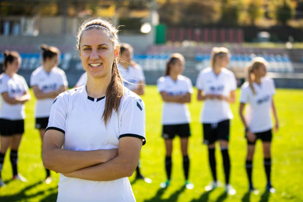 istock Young female soccer player on soccer field 1218986014
