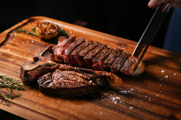 istock Grilled T-bone Steak, serving with rich ingredients, delicious and being hungered image 1218986129