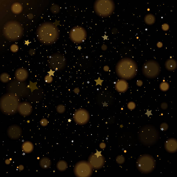 istock Gold bokeh, shiny glittering golden and silver stars confetti 1218986170
