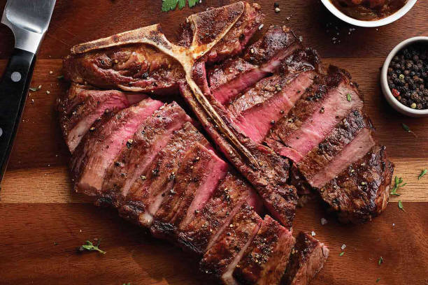istock Grilled T-bone Steak, serving with rich ingredients, delicious and being hungered image 1218987067