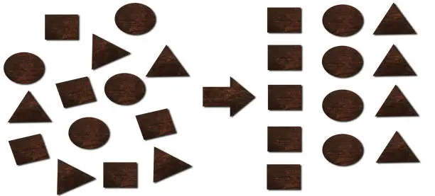 Photo of forming geometry to categorize with wooden cube and triangle,  categorizing geometry concept
