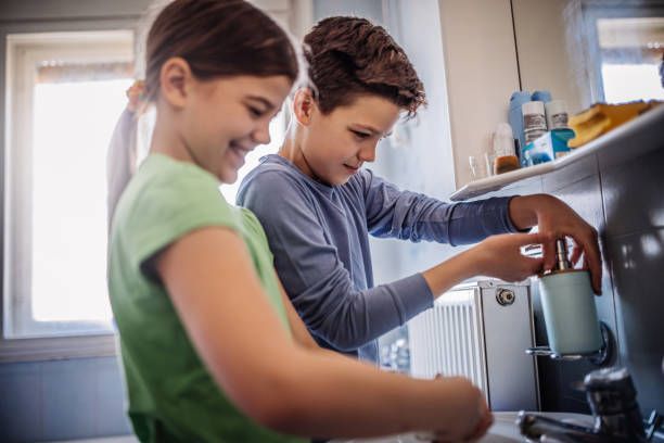istock Child Washing hands for protecting from virus 1218987366