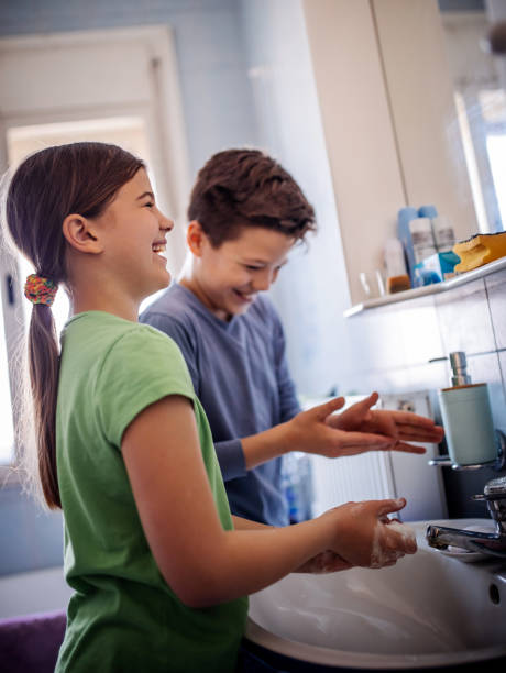 istock Child Washing hands for protecting from virus 1218987422