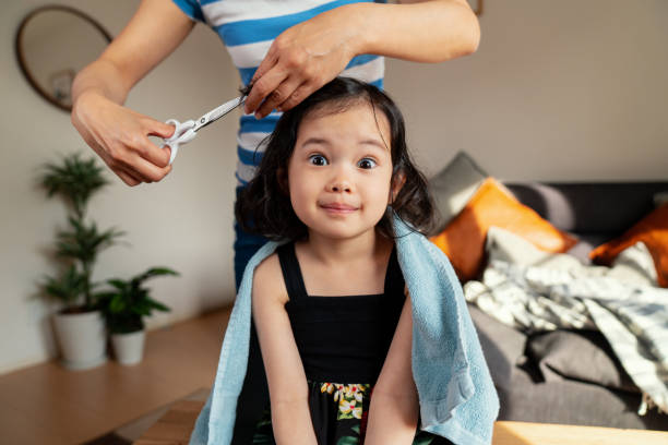3,441 Girl Cutting Hair Stock Photos, Pictures & Royalty-Free Images -  iStock | Woman cutting hair, Family dinner