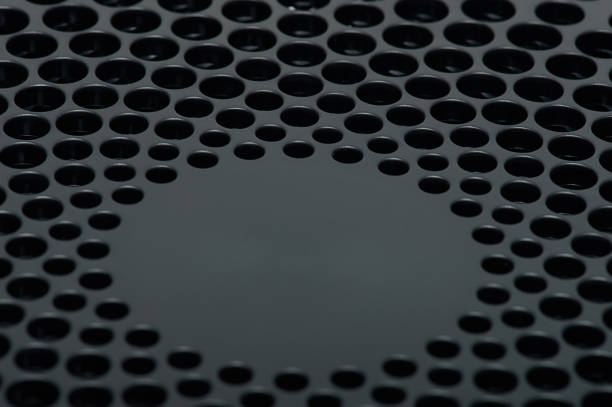 Pattern of vent holes in black plastic Pattern of vent holes in black plastic surface clsoe up view metal grate photos stock pictures, royalty-free photos & images