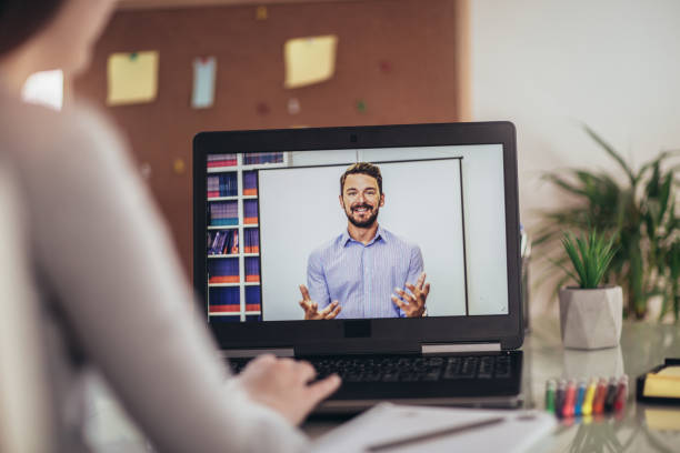istock Young student watching lesson online and studying from home. 1218990031