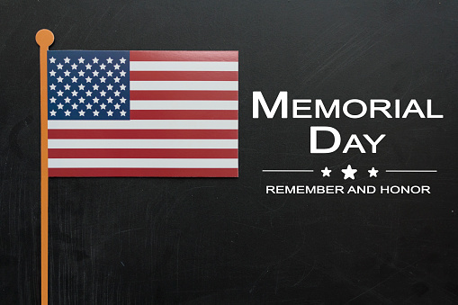 American flag on blackboard with the text Memorial Day. USA holiday,Memorial day, celebration concept.