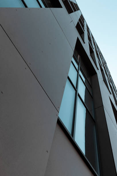 istock Windows and other facade elements of a large building. Perspective of a office skyscraper 1218992022