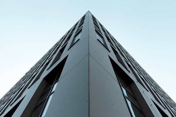 istock Symmetry abstract view of a modern building facade. Pyramid-shaped skyscraper 1218992030