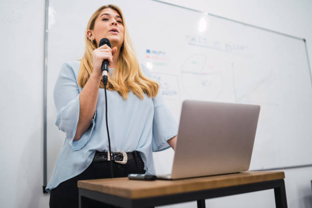 istock business woman explaining plan of work in conference. 1218999256