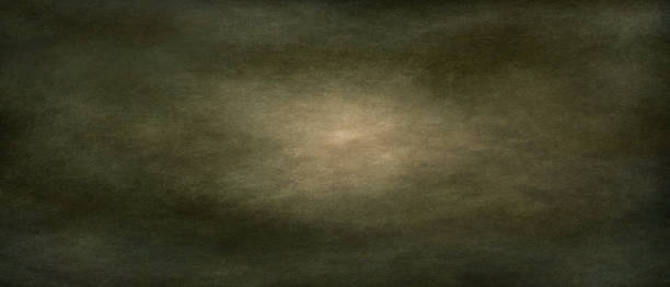 istock Green background with abstract vintage grunge texture, and light in the centre 1218999623