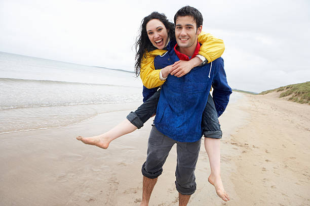 istock Happy couple on beach in love 121900227