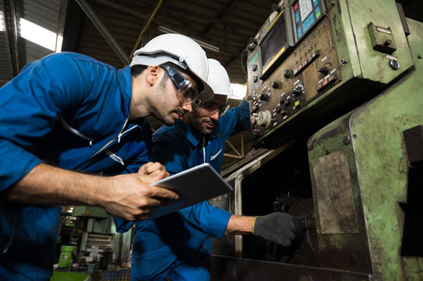 istock Industrial workers are working on projects in large industrial plants with many devices. 1219003867