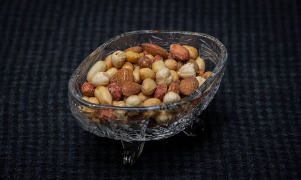 istock Nuts and healthy almond in bowl 1219007326