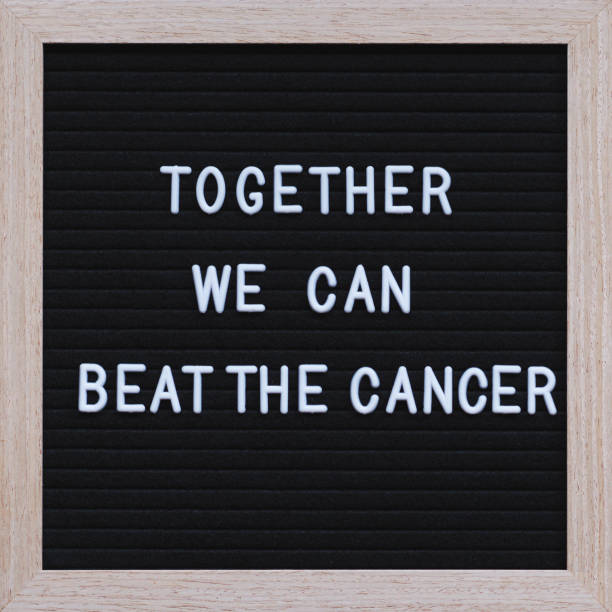istock Together we can beat the cancer text on blackboard 1219013777