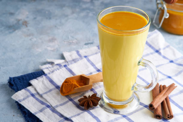 istock Turmeric milk. Cooked golden milk in a glass 1219013882